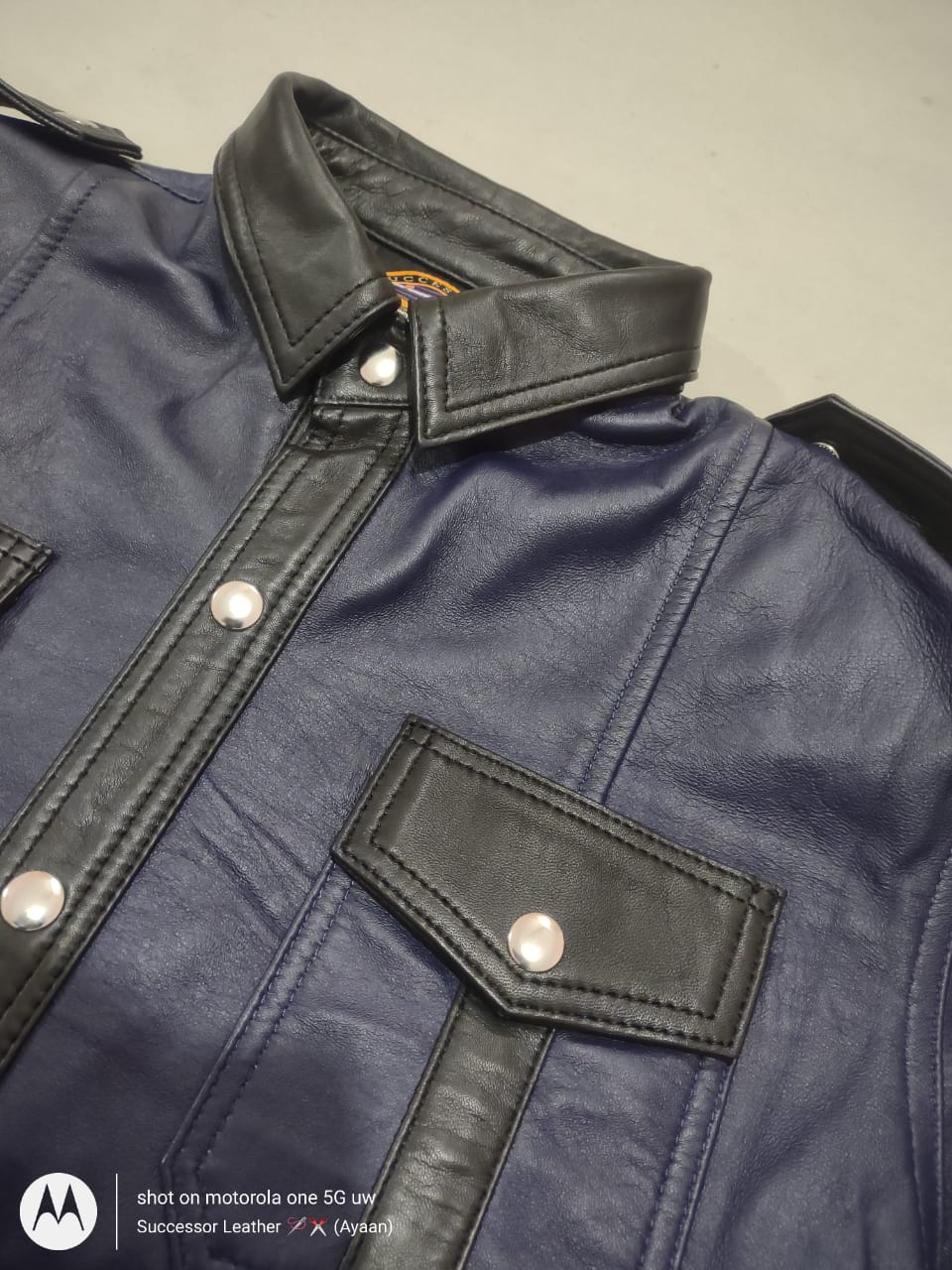 NAVY LEATHER SHIRT WITH BLACK CONTRAST.