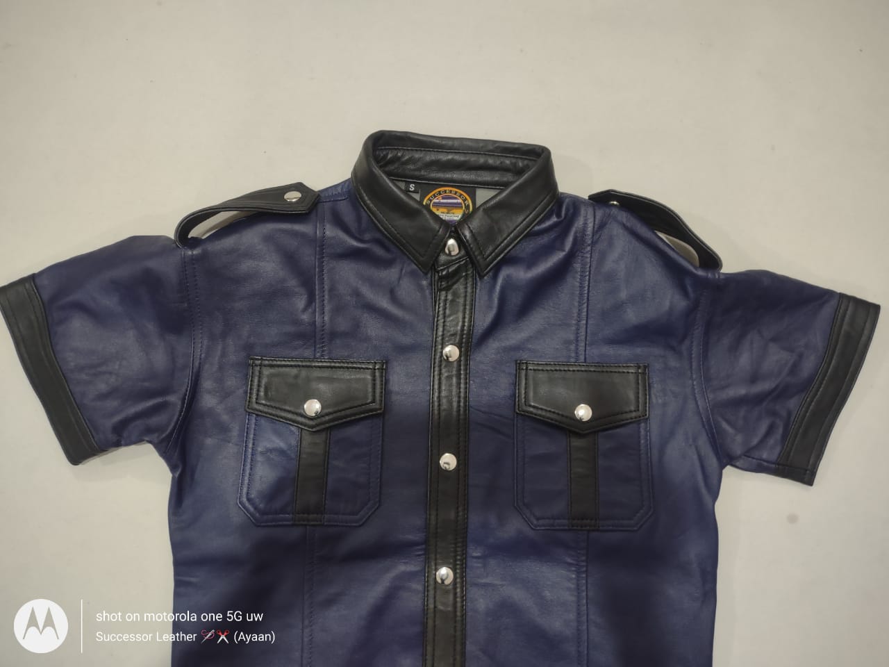 NAVY LEATHER SHIRT WITH BLACK CONTRAST.