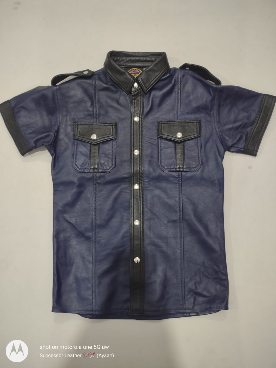 NAVY LEATHER SHIRT WITH BLACK CONTRAST.