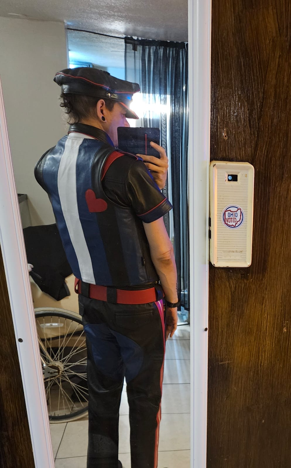 LEATHER VEST WITH LEATHER PRIDE ON WHOLE BACK OF THE VEST