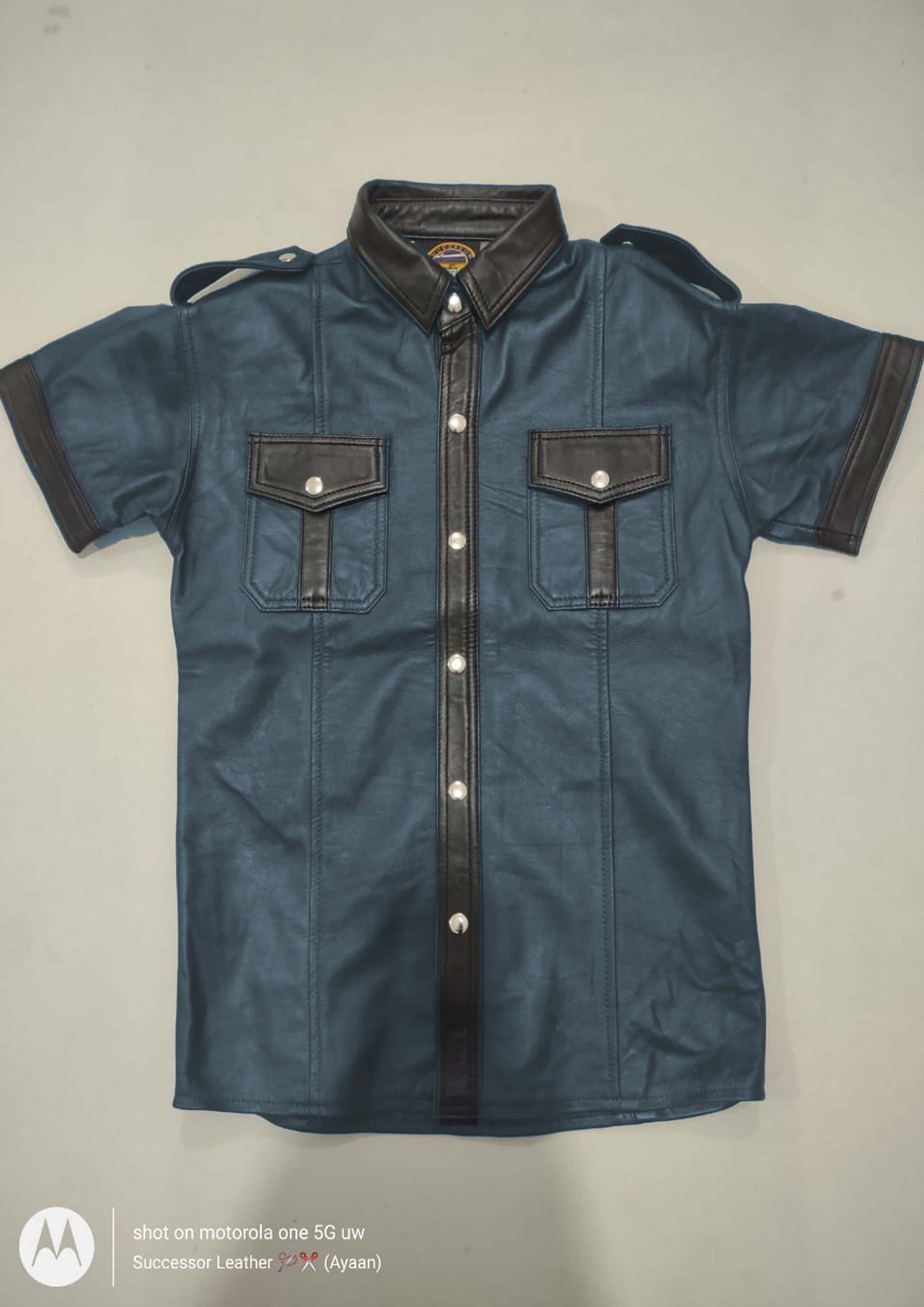 NAVY LEATHER SHIRT WITH BLACK CONTRAST.