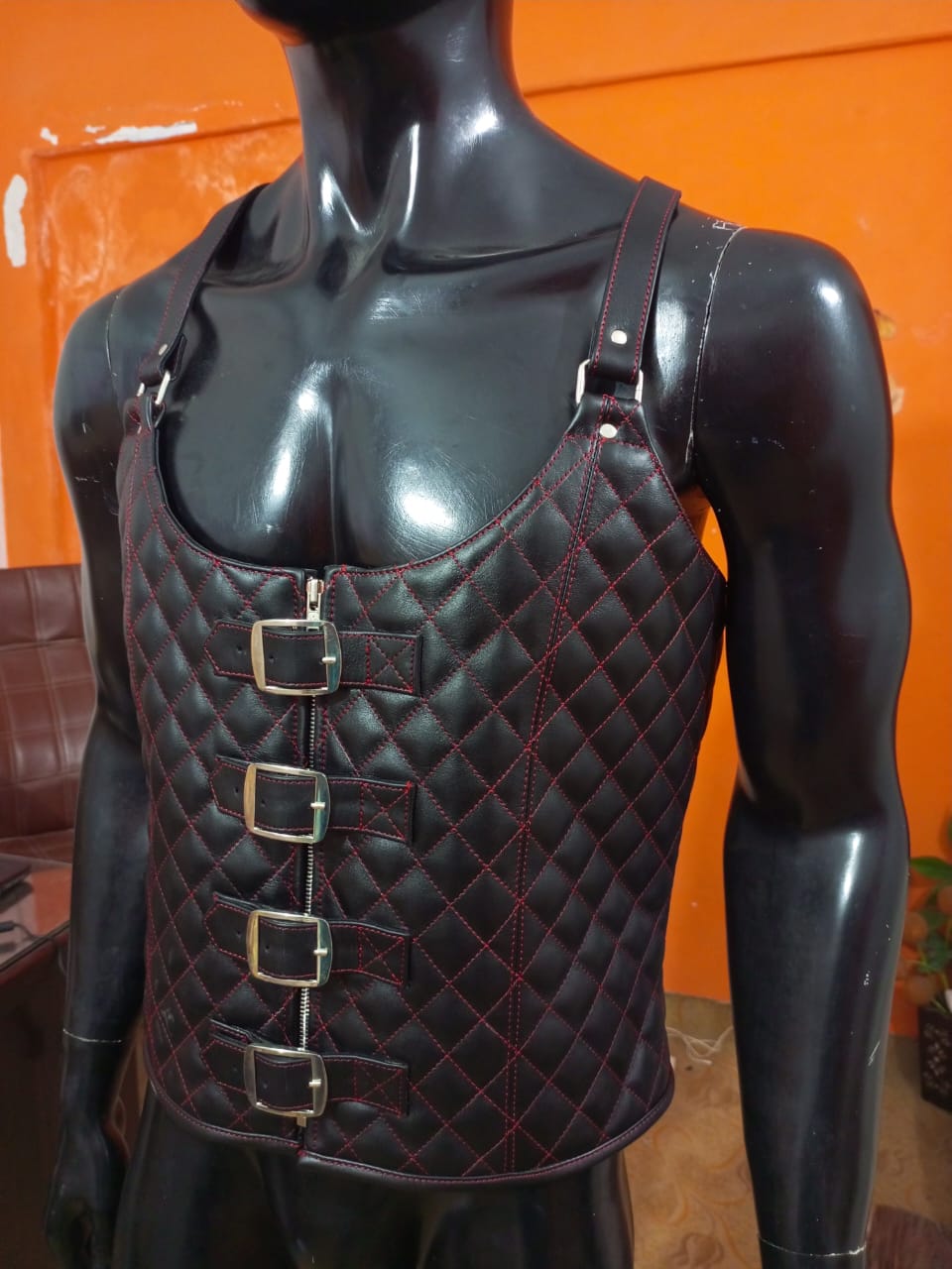 LEATHER QUILTED CORSET VEST WITH RED THREAD
