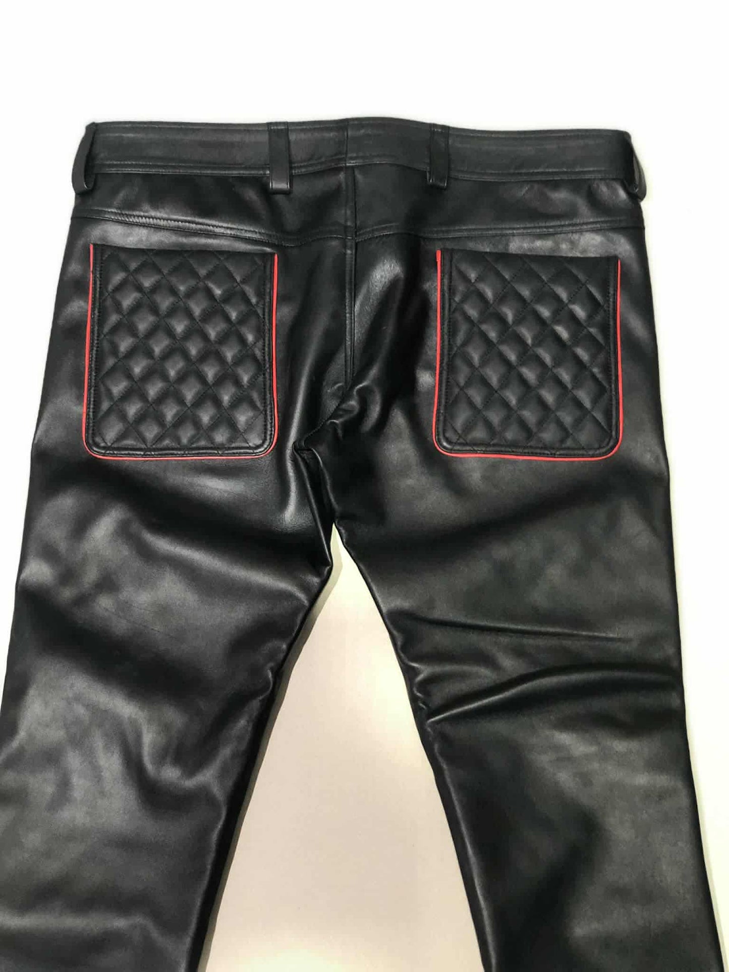BLACK LAMB LEATHER QULITED PANT WITH RED TRIMS.