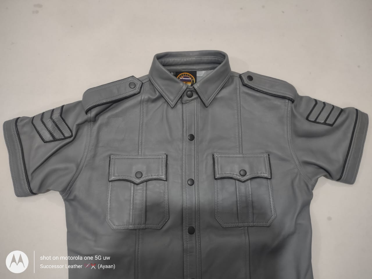 CUSTOM MADE GREY LEATHER SHIRT WITH BLACK CONTRAST.