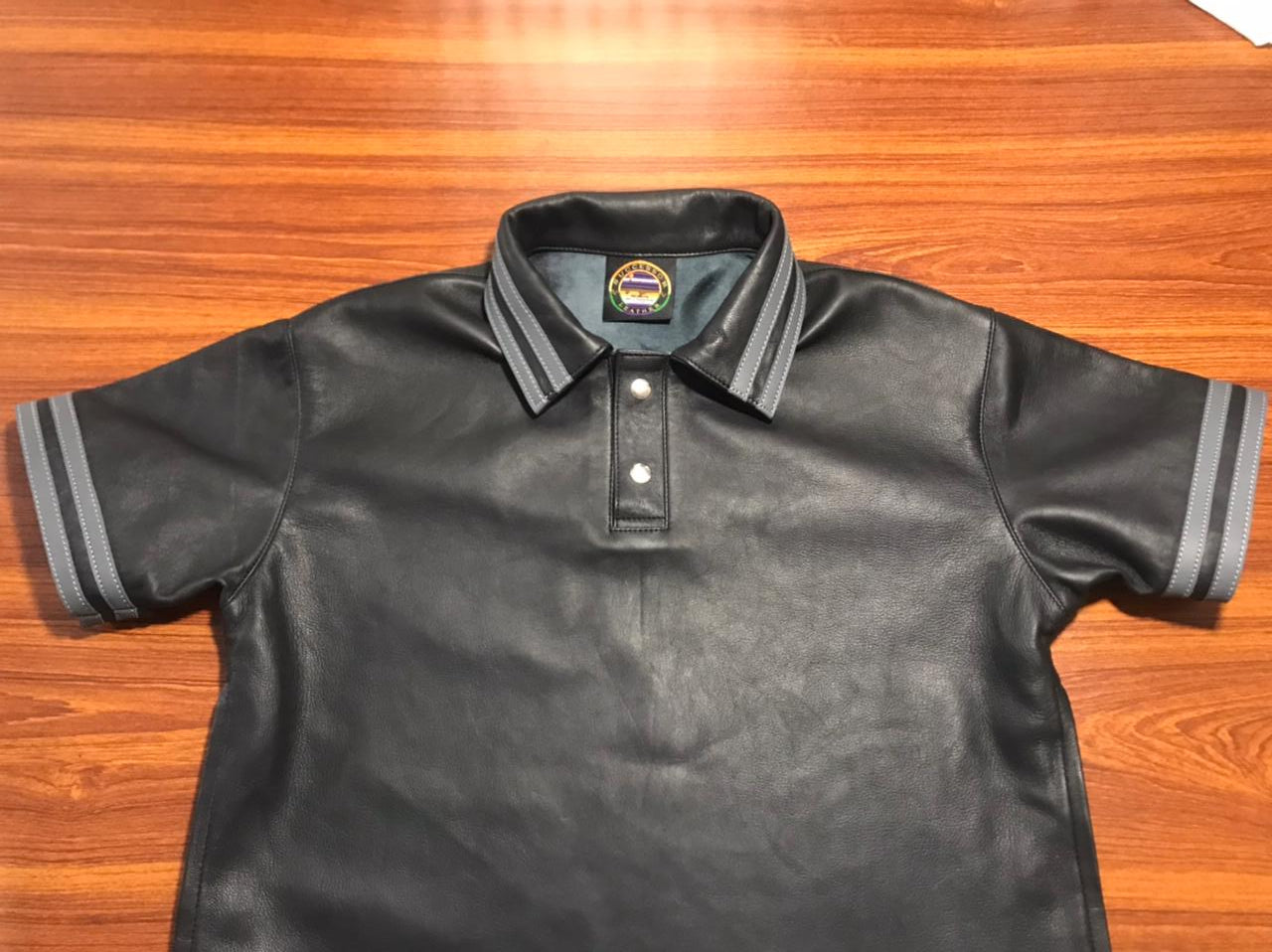 LEATHER BLACK POLO WITH GRAY STRIPES