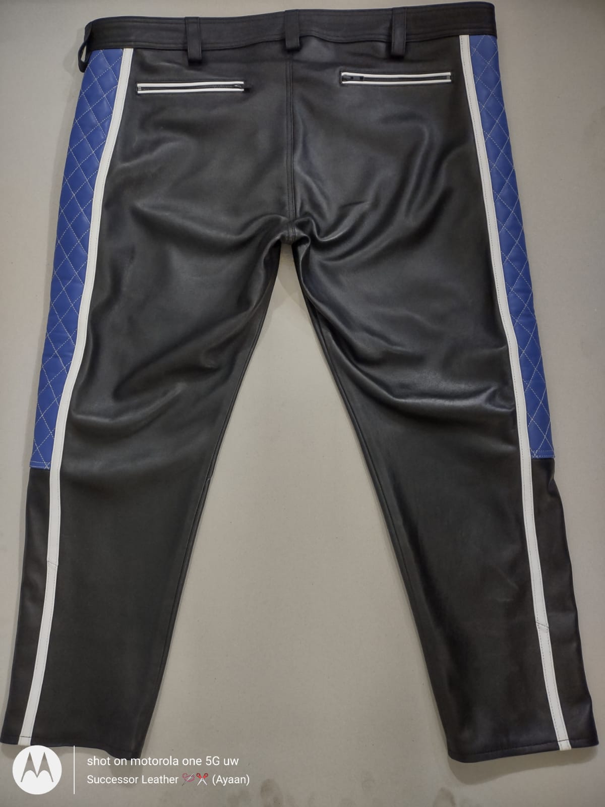 LEATHER PANT WITH BLUE QUILTED AND WHITE THREAD UNDER KNEE
